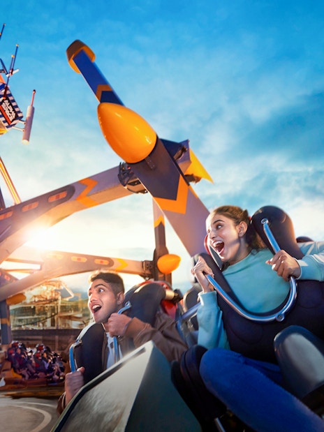 People enjoying a thrilling ride at Genting SkyWorld Outdoor Theme Park.