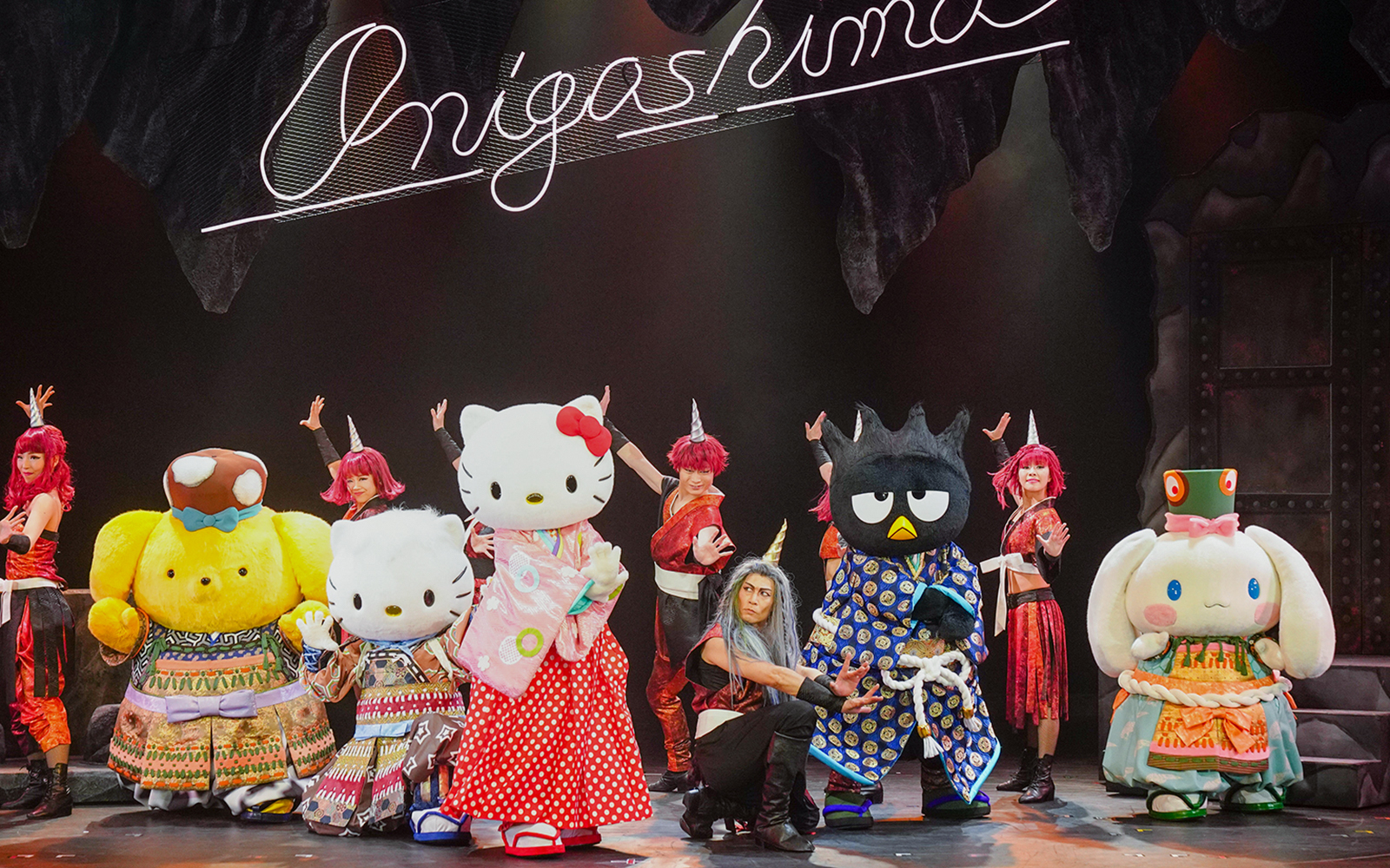 Sanrio characters performing on stage at Sanrio Puroland, Japan.