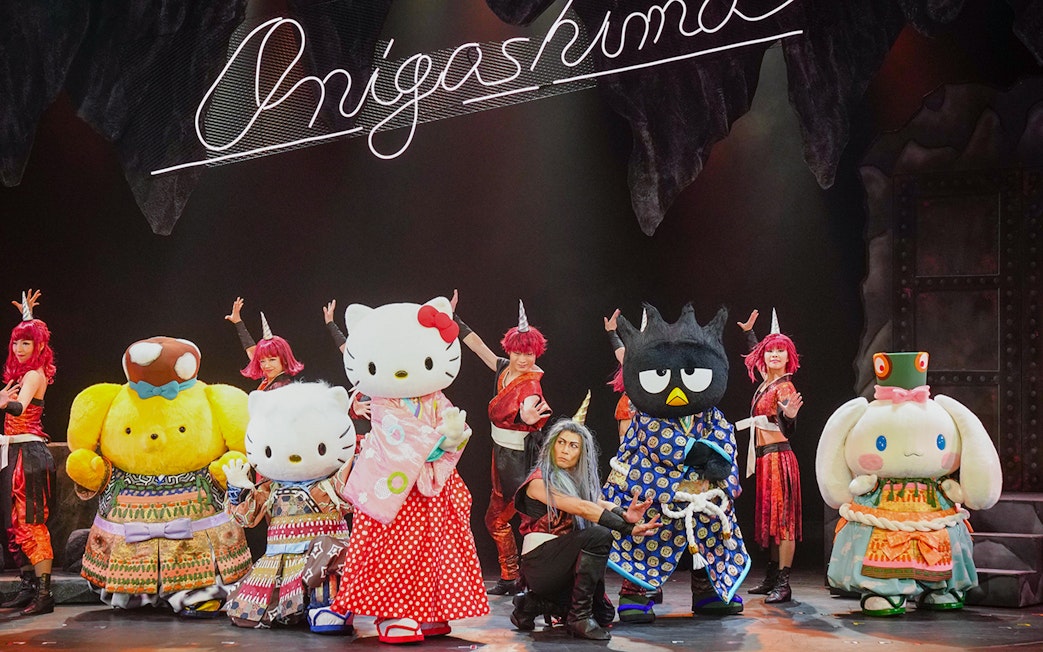 Sanrio characters performing on stage at Sanrio Puroland, Japan.