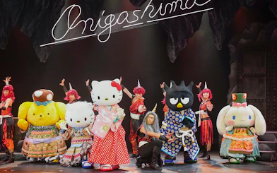 Sanrio characters performing on stage at Sanrio Puroland, Japan.