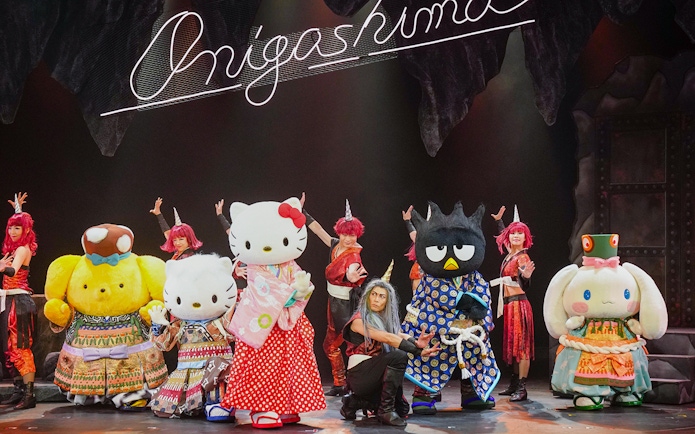 Sanrio characters performing on stage at Sanrio Puroland, Japan.