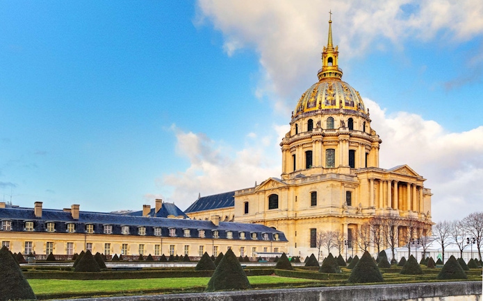 Invalides Museum dome and facade in Paris, France.