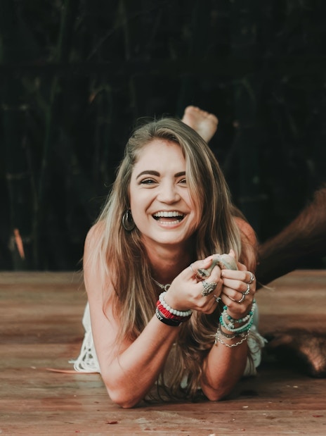 Person interacting with an orangutan at Lombok Wildlife Park.