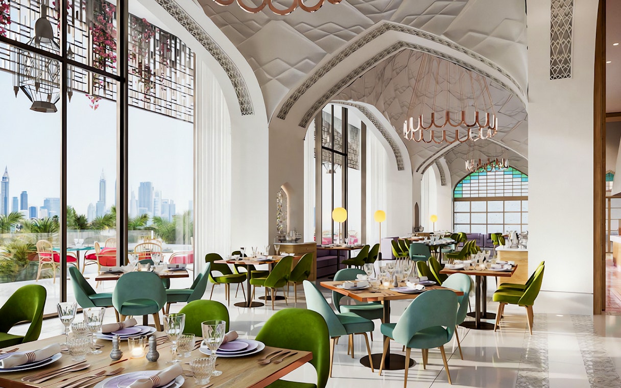 Arianas Persian Kitchen dining area with elegant decor and city skyline view.