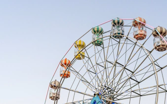 Ferris wheel with colorful gondolas at Old Town, Orlando.