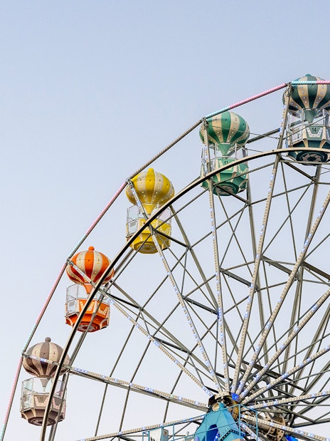 Ferris wheel with colorful gondolas at Old Town, Orlando.
