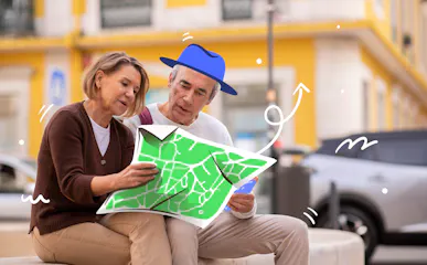 Couple examining a map in a city setting, ideal for first-time visitors.