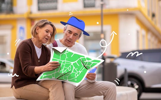 Couple examining a map in a city setting, ideal for first-time visitors.