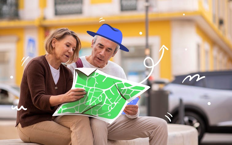 Couple examining a map in a city setting, ideal for first-time visitors.