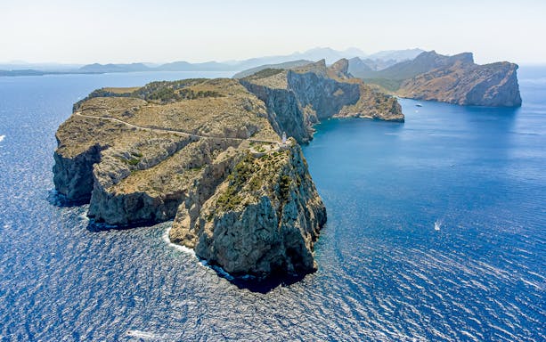 Aerial view of Cap Formentor cliffs and lighthouse, Mallorca, on a boat trip to Cala Figuera.