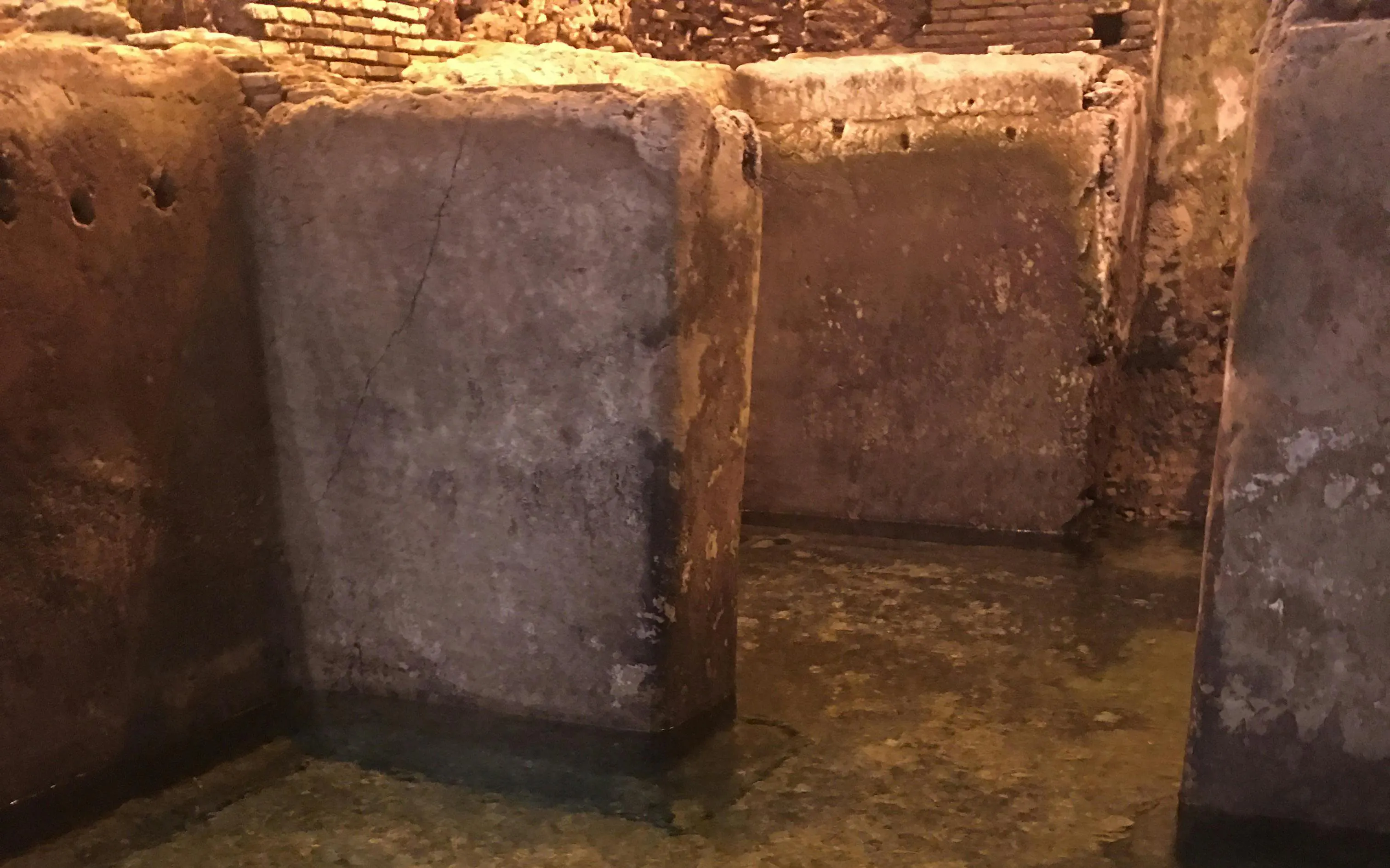 Ancient stone structures in the Trevi District Underground tour, Rome.
