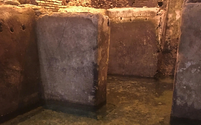 Ancient stone structures in the Trevi District Underground tour, Rome.