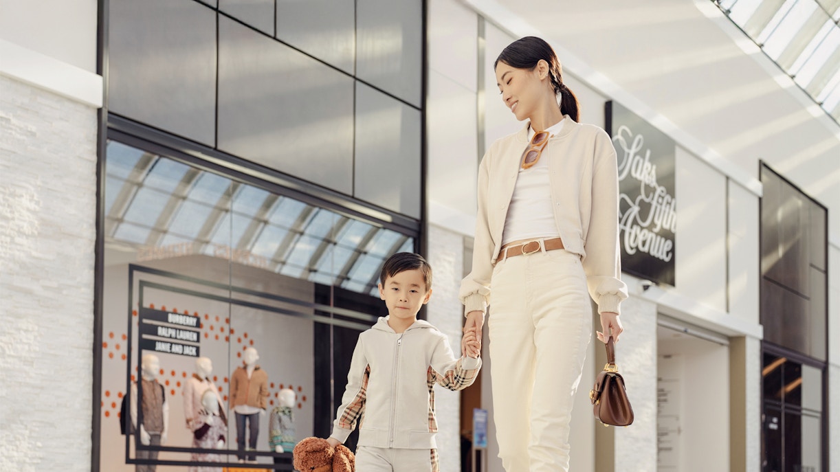 Parent and child shopping at American Dream Mall, New York.
