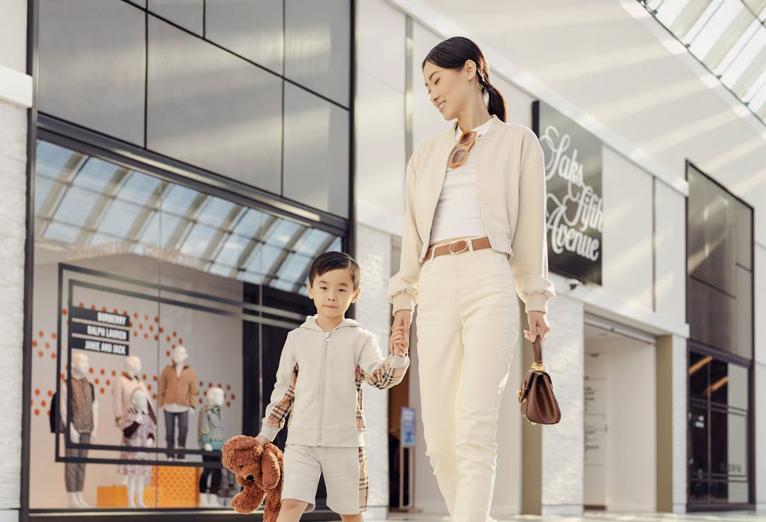 Parent and child shopping at American Dream Mall, New York.