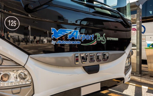 Front view of Autostradale Airport Transfer bus at terminal.