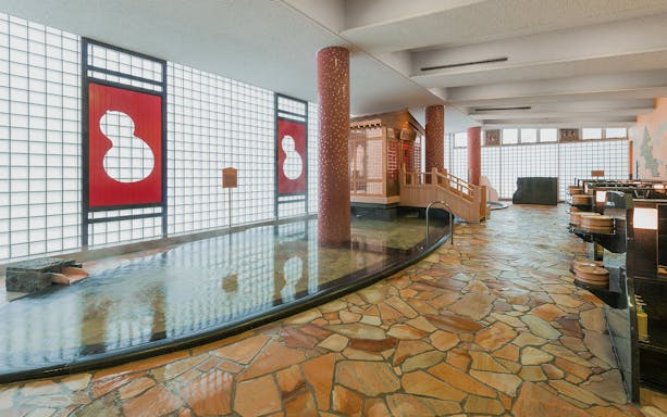 Arima Onsen Taiko No Yu Spa interior with traditional Japanese decor and hot spring bath.