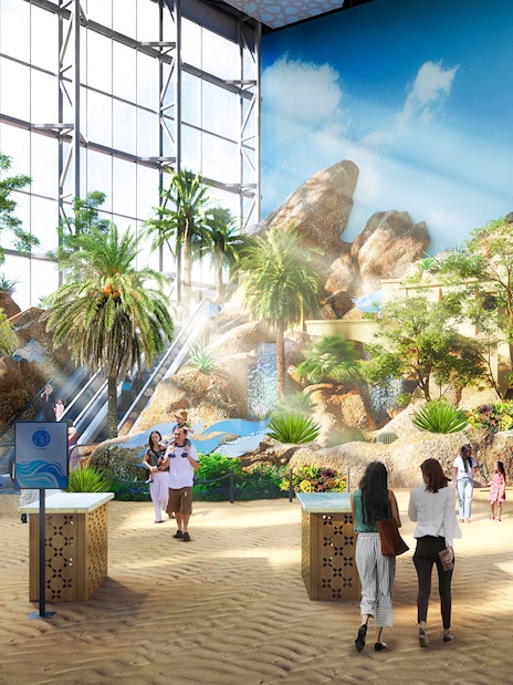 Visitors exploring indoor tropical landscape at SeaWorld Abu Dhabi, part of combo National Aquarium tickets.