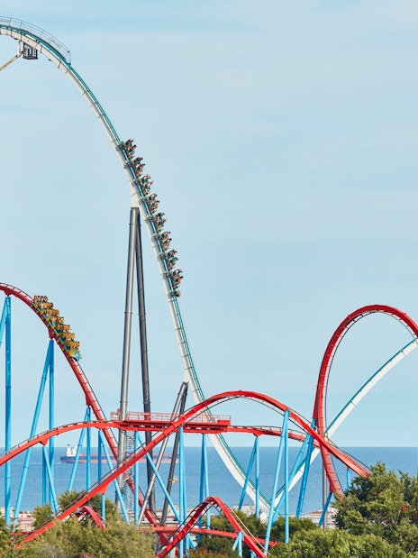 Shambhala roller coaster at PortAventura with ocean backdrop.