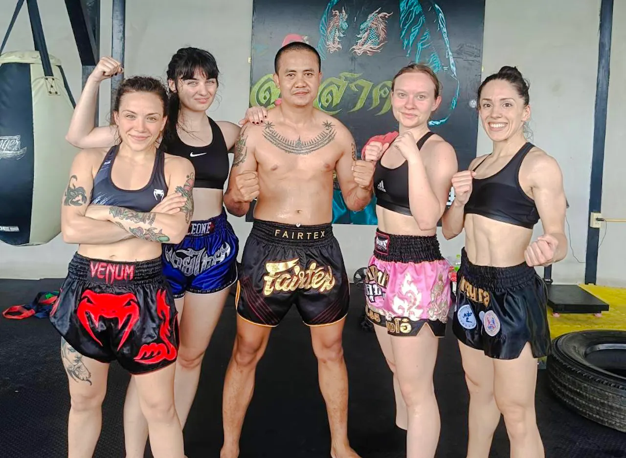 Group of beginners in Muay Thai boxing class, Pattaya gym.