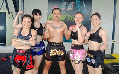 Group of beginners in Muay Thai boxing class, Pattaya gym.