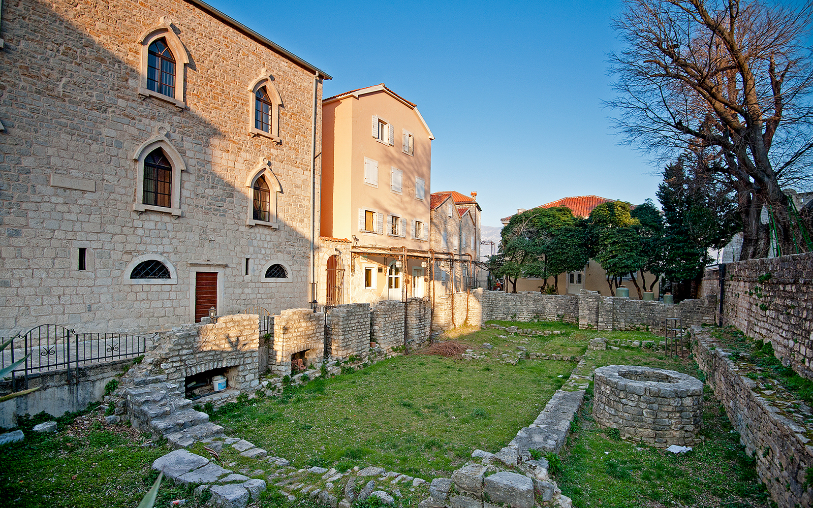Historic stone buildings and ancient ruins in Kotor, Montenegro.