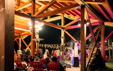 Outdoor evening gathering with live music at Glen Blair Bar, San Francisco.
