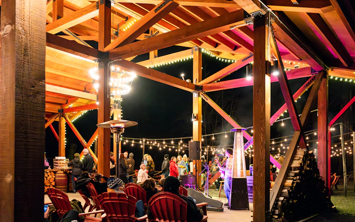 Outdoor evening gathering with live music at Glen Blair Bar, San Francisco.