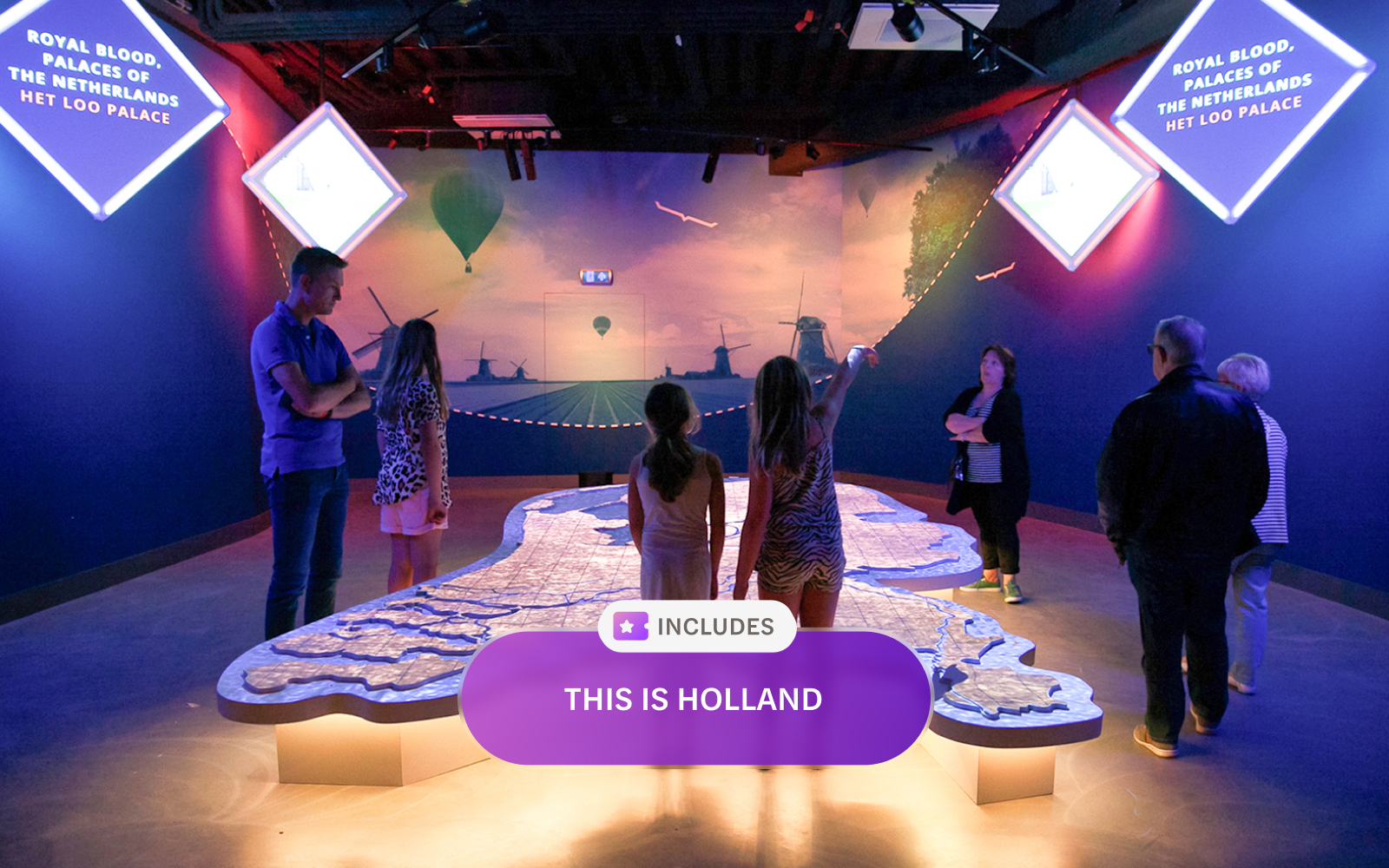 Visitors exploring interactive map at This Is Holland in Amsterdam.