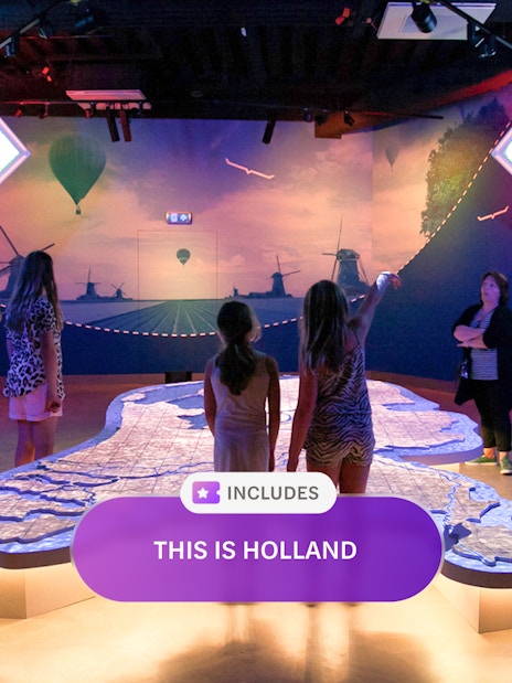 Visitors exploring interactive map at This Is Holland in Amsterdam.