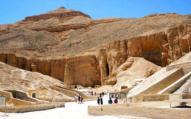 Tourists exploring the Valley of the Kings in Luxor, Egypt.