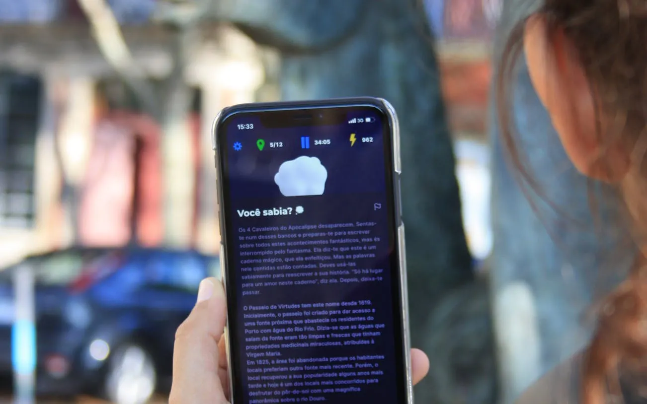 Smartphone displaying a self-guided city exploration game in Rome.