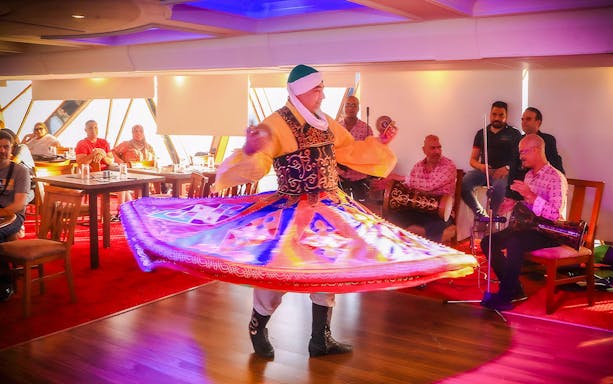 Tanoura dancer performing on a Nile River dinner cruise.