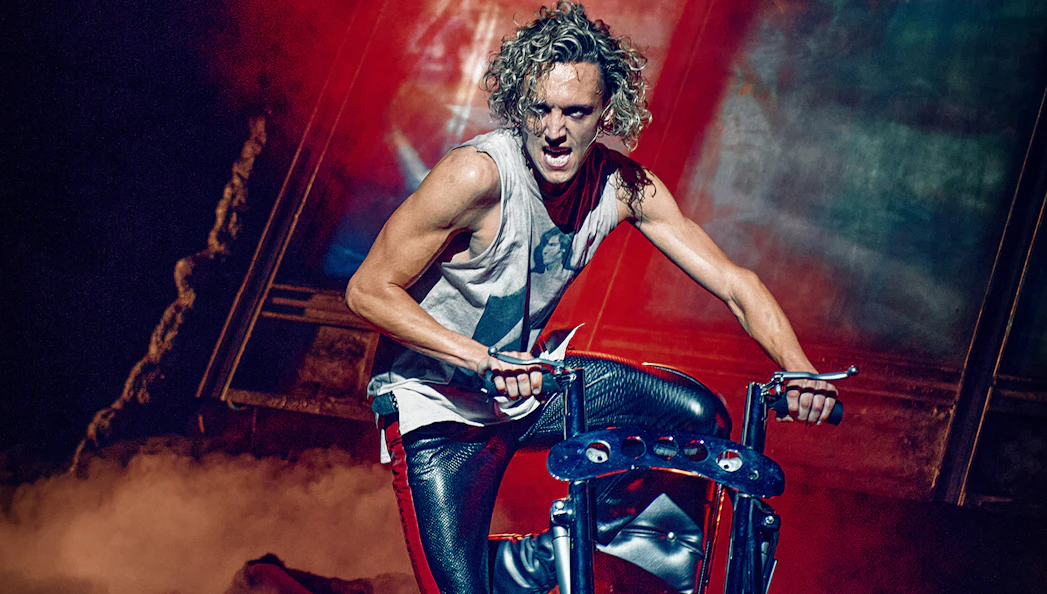 Performer on motorcycle during Bat Out Of Hell singalong event.