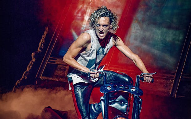 Performer on motorcycle during Bat Out Of Hell singalong event.