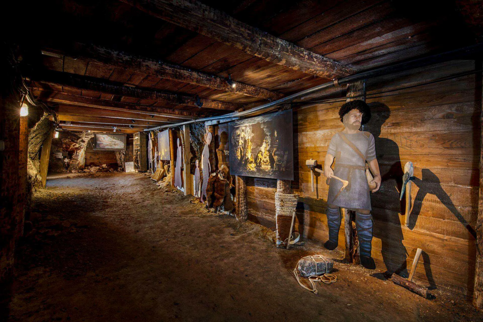 Hallstatt Salt Mine exhibit with historical figures and tools, Salzburg tour.