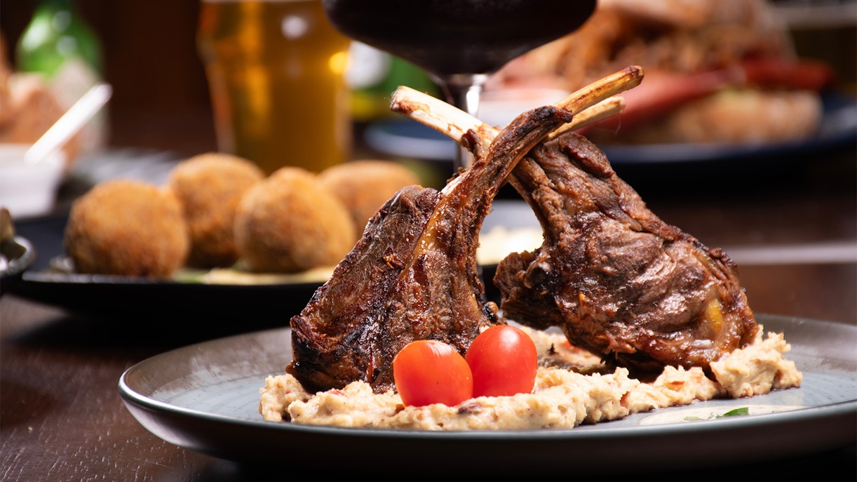 https://cdn-imgix.headout.com/media/images/d9396bef71a179809fffab47b63f91fa-steakhouse.jpg