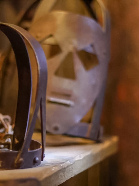 Medieval torture devices on display at The Clink Prison Museum, London.