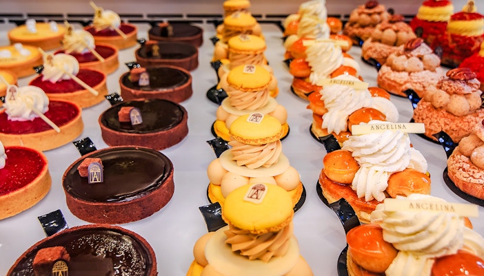 Bakery sweets display in Rue de Rivoli, featuring tarts and pastries from Angelina.