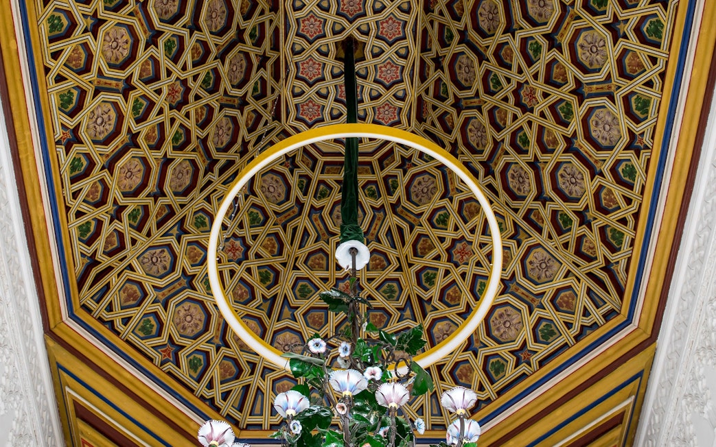 Ceiling decoration with intricate geometric patterns at Pena Palace, Sintra.