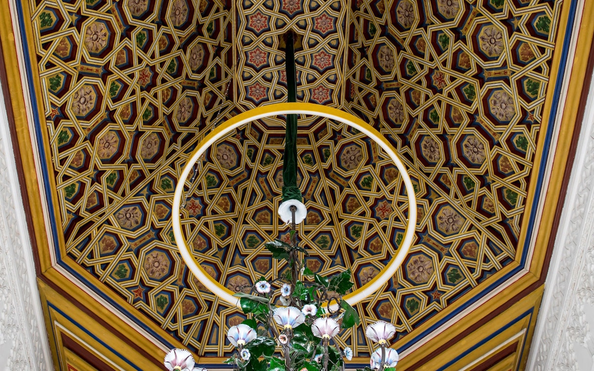 Ceiling decoration with intricate geometric patterns at Pena Palace, Sintra.