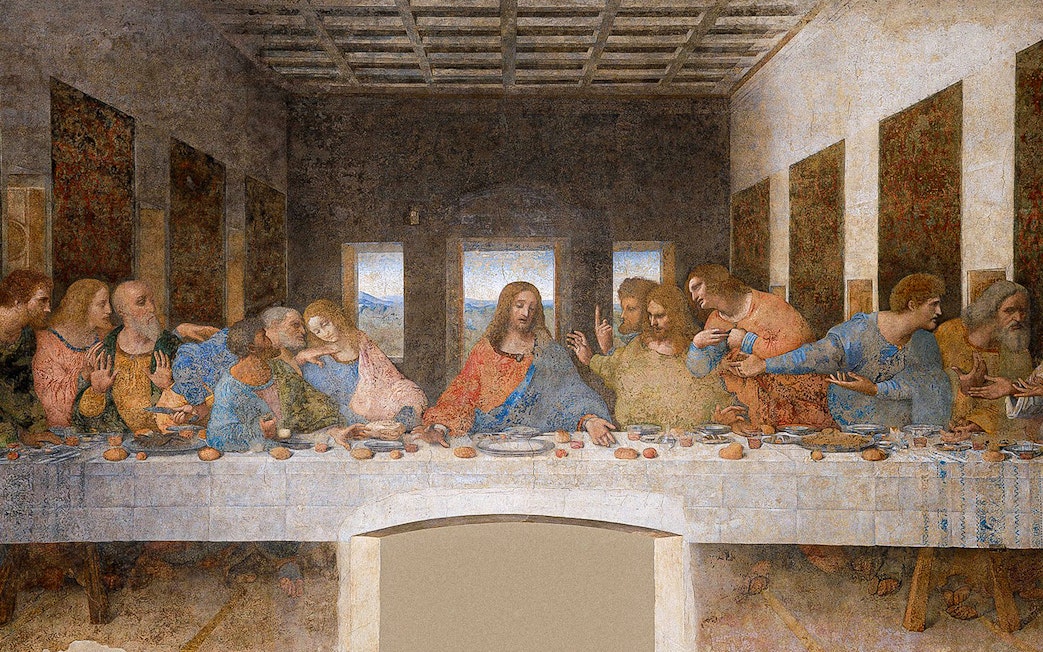 Closeup of Da Vinci's Last Supper, depicting Jesus and apostles at a long table in Milan, Italy.