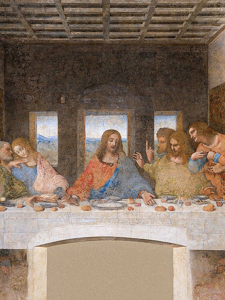 Closeup of Da Vinci's Last Supper, depicting Jesus and apostles at a long table in Milan, Italy.