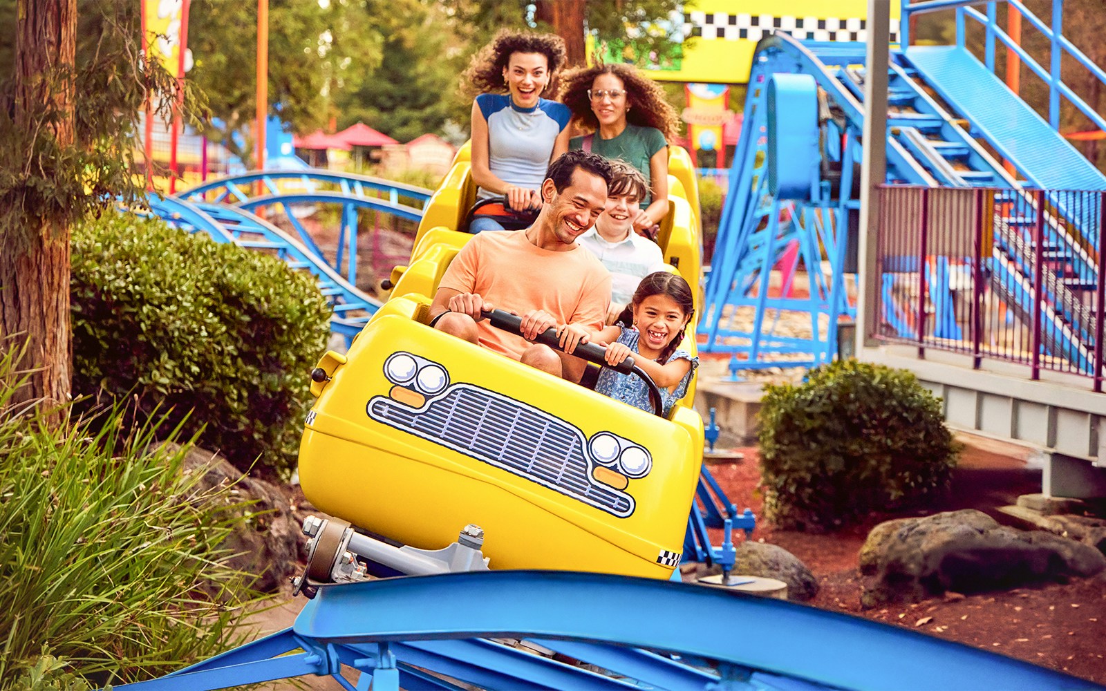 Families enjoying Lucy's Crabbie Cabbies ride at California's Great America.