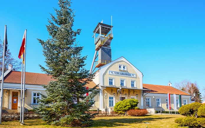Entrance of the Wieliczka Salt Mine historic building with tower, Poland.