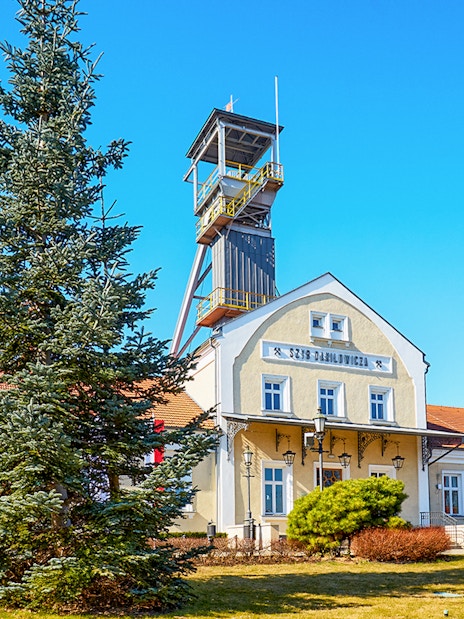 Entrance of the Wieliczka Salt Mine historic building with tower, Poland.