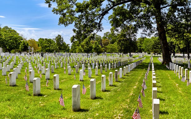 Flags on grave sites at Arlington National Cemetery on Memorial Day.