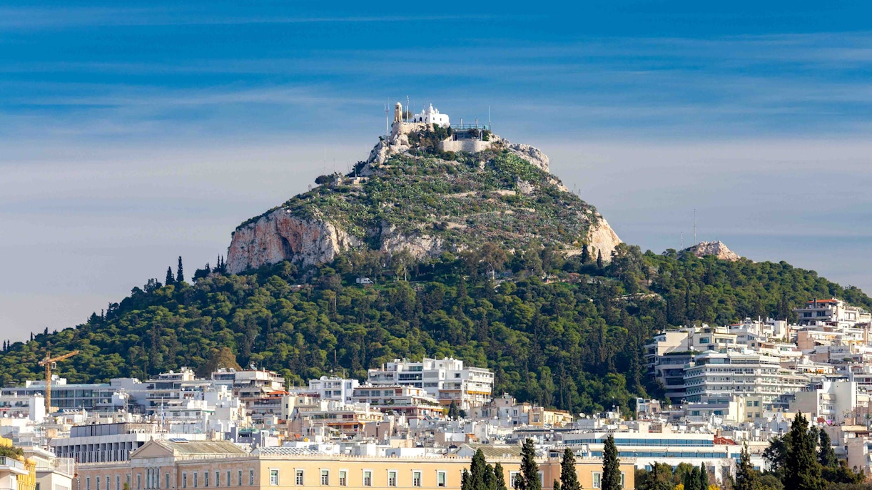 Mount Lycabettus view of Athens cityscape during New Year celebrations.