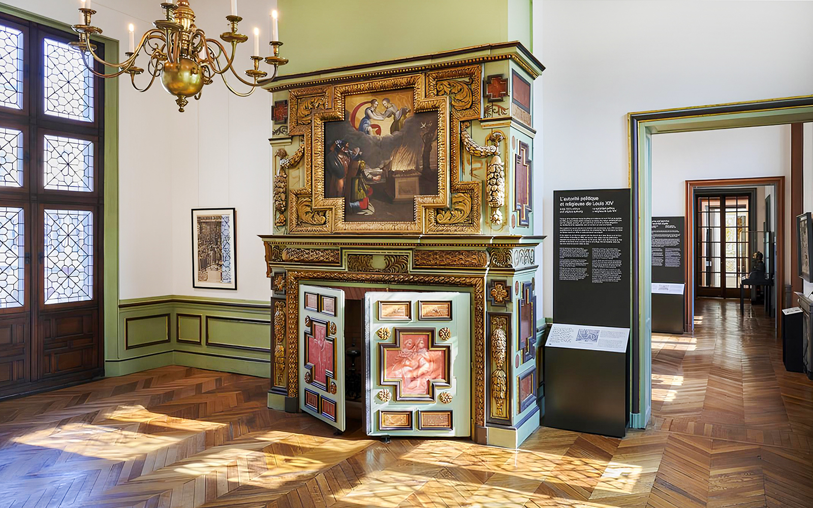 Carnavalet Museum ornate fireplace and exhibition room in Paris.