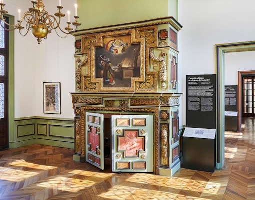 Carnavalet Museum ornate fireplace and exhibition room in Paris.