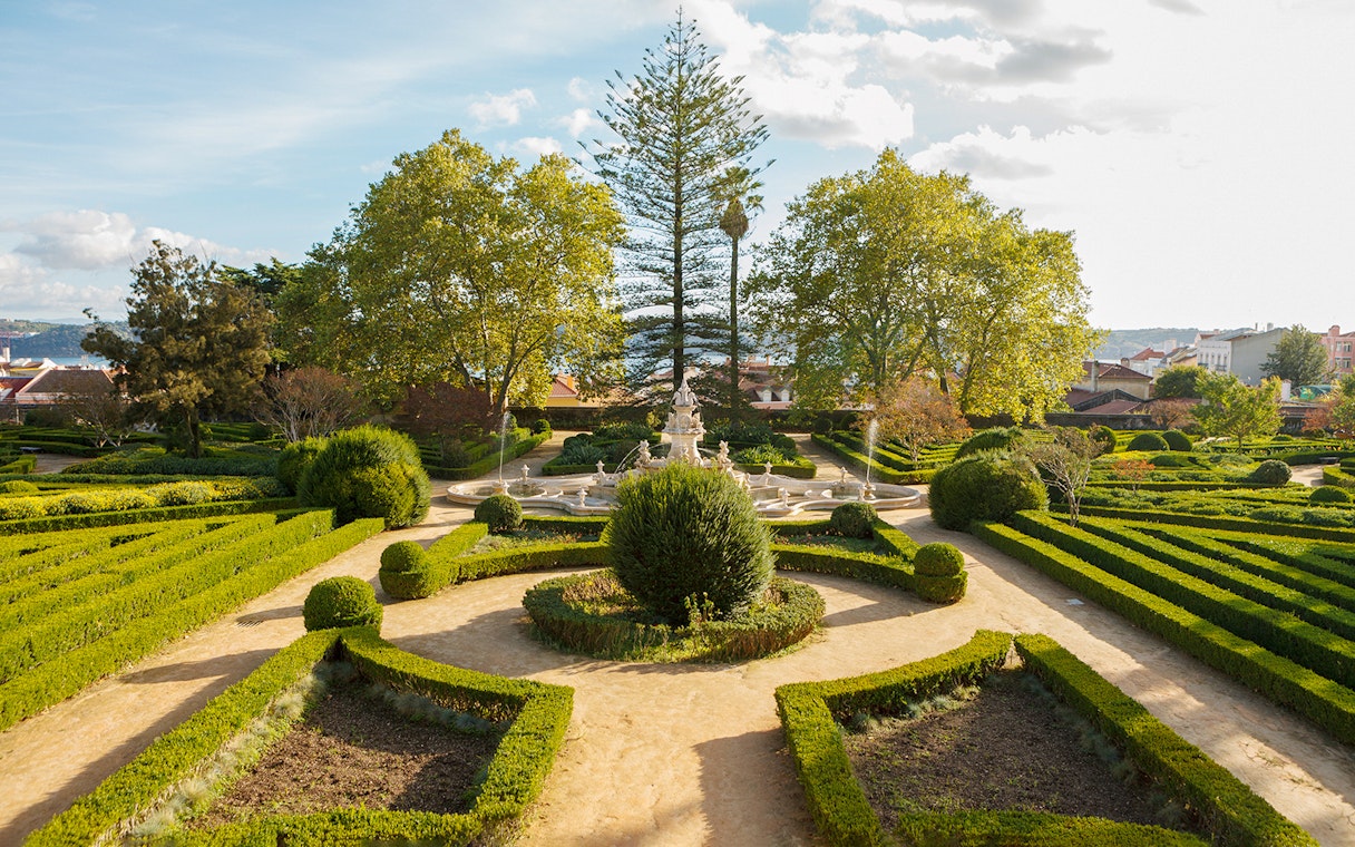 Formal garden with fountain at National Palace of Ajuda, Lisbon.
